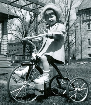girl on tricycle